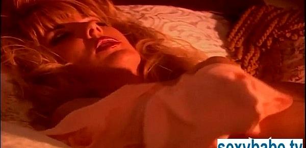  Jill Kelly masturbating on the bed
